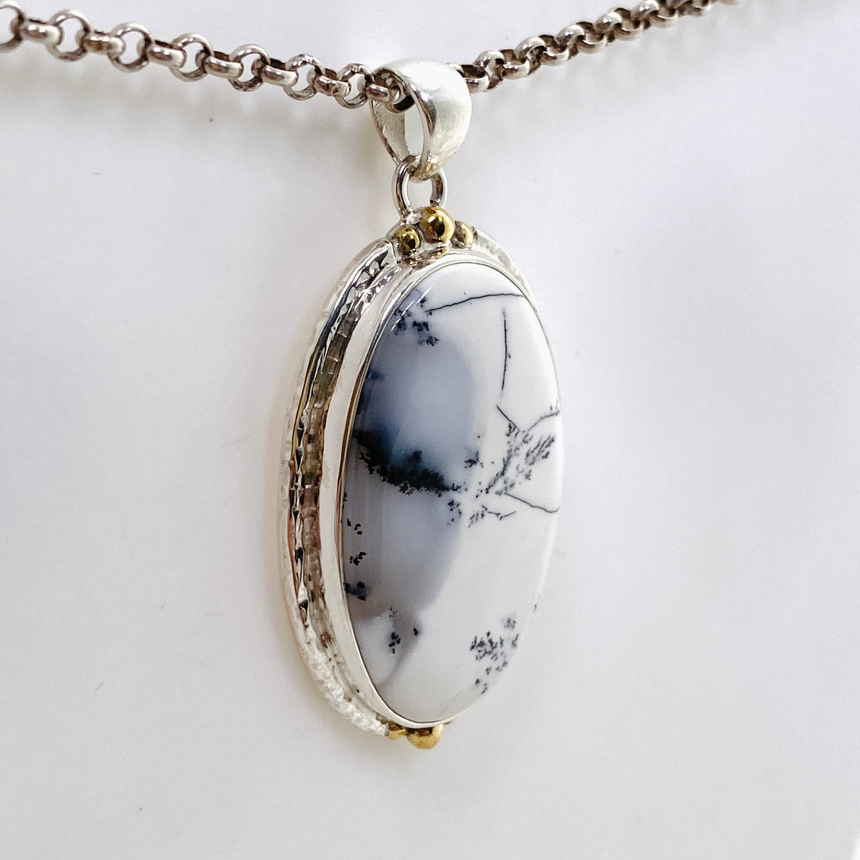 Dendritic Opal Oval Cabochon Pendant in a Decorative Setting KPGJ4676