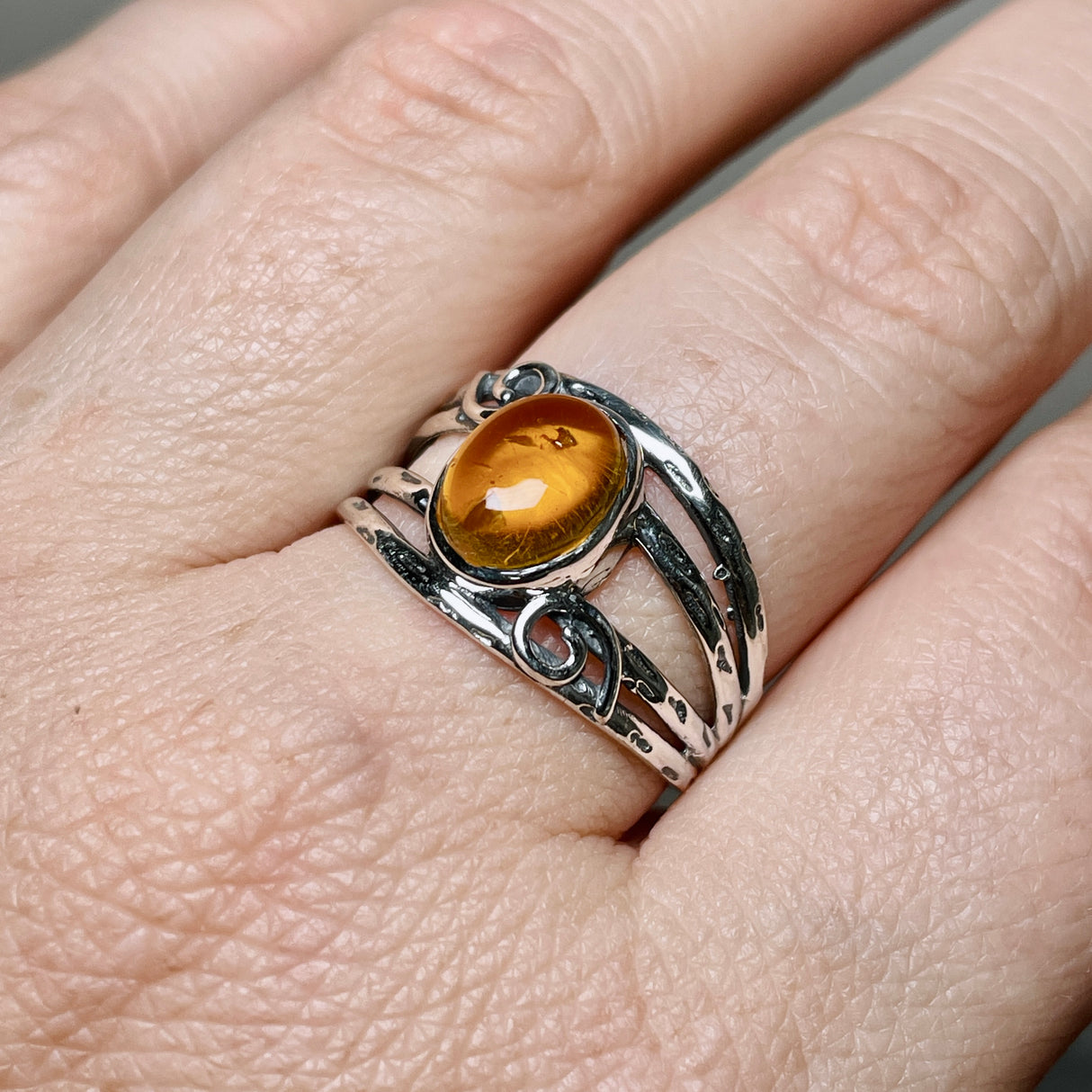 Amber Oval Cabochon Ring in a Decorative Setting R4025