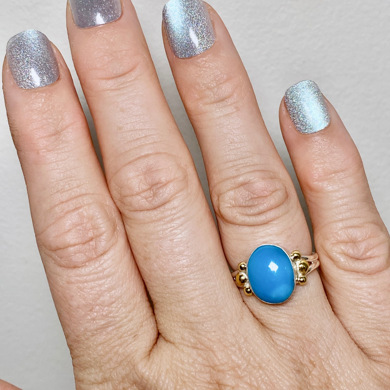 Arizona Turquoise Oval Cabochon Ring with Brass Accents Size 7 KRGJ3399