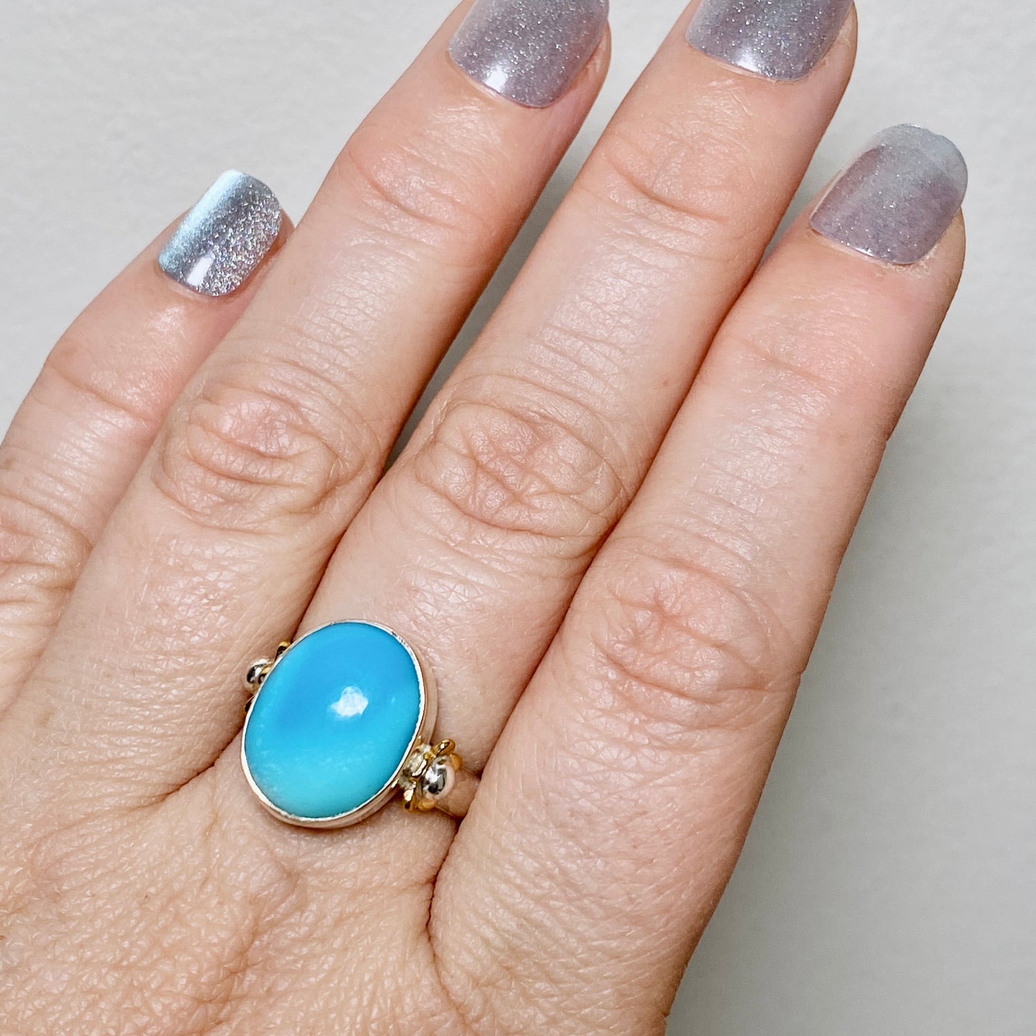 Arizona Turquoise Oval Cabochon Ring with Brass Accents Size 7 KRGJ3400