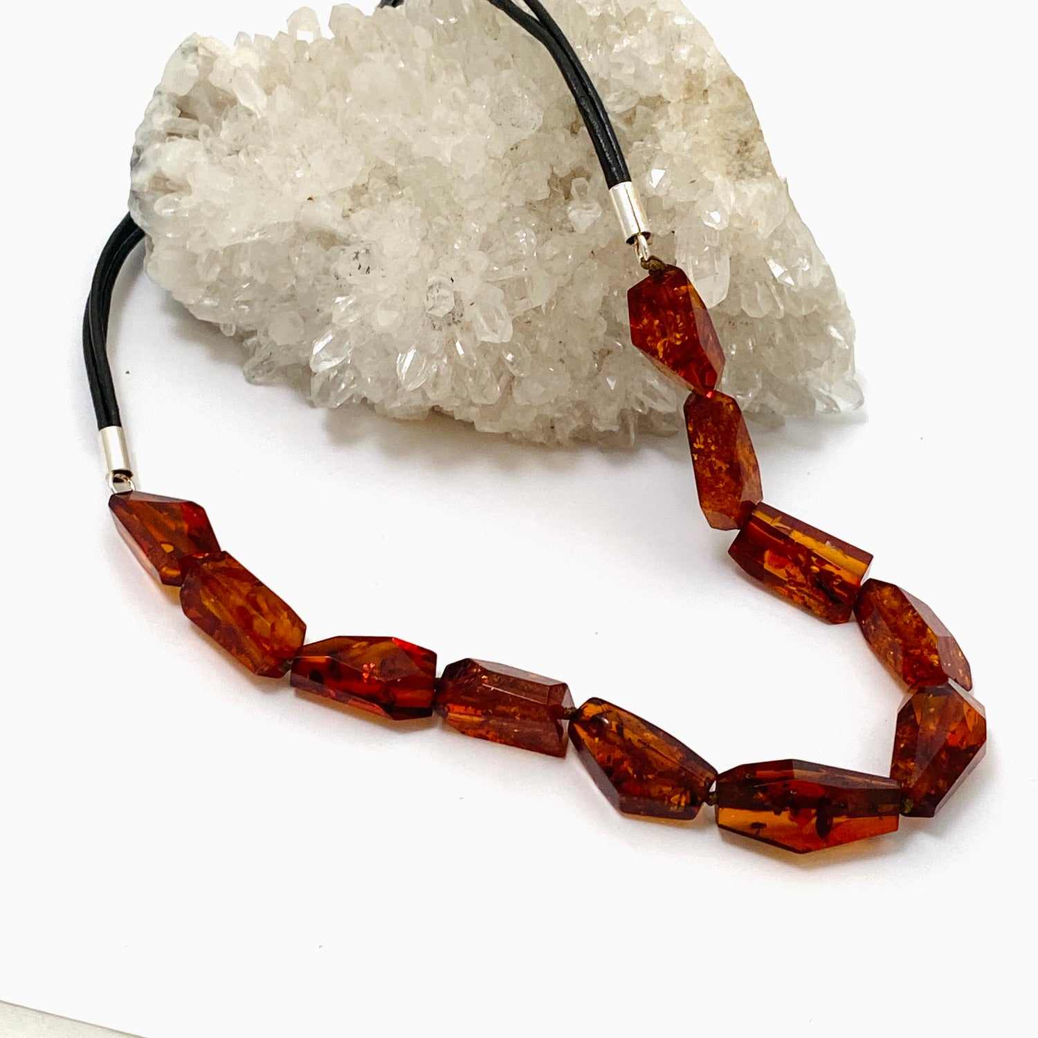 Baltic Amber Cognac beaded necklace on black leather AMB308