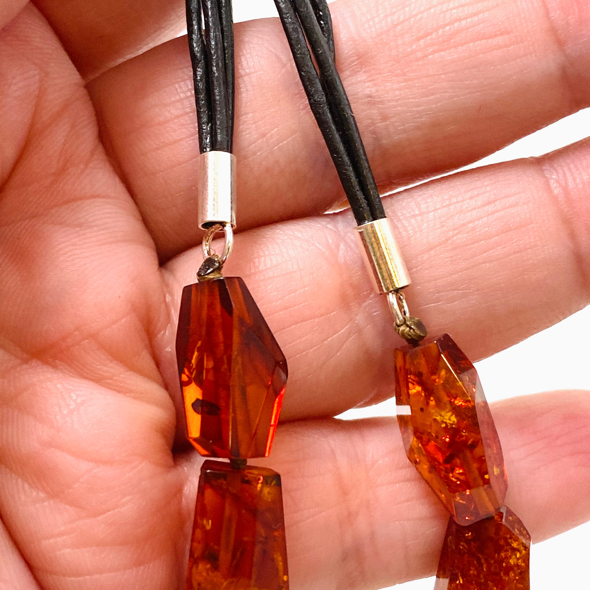 Baltic Amber Cognac beaded necklace on black leather AMB308