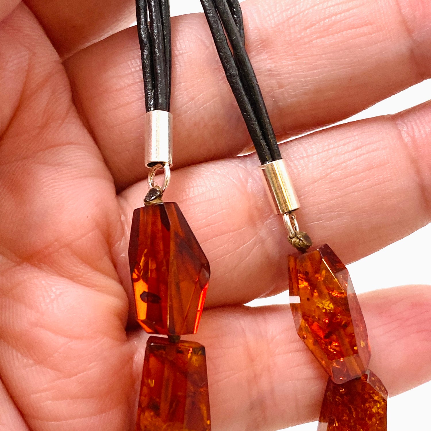 Baltic Amber Cognac beaded necklace on black leather AMB308