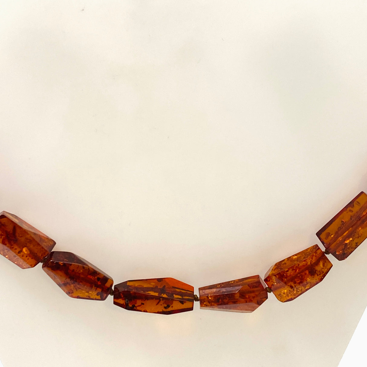 Baltic Amber Cognac beaded necklace on black leather AMB308