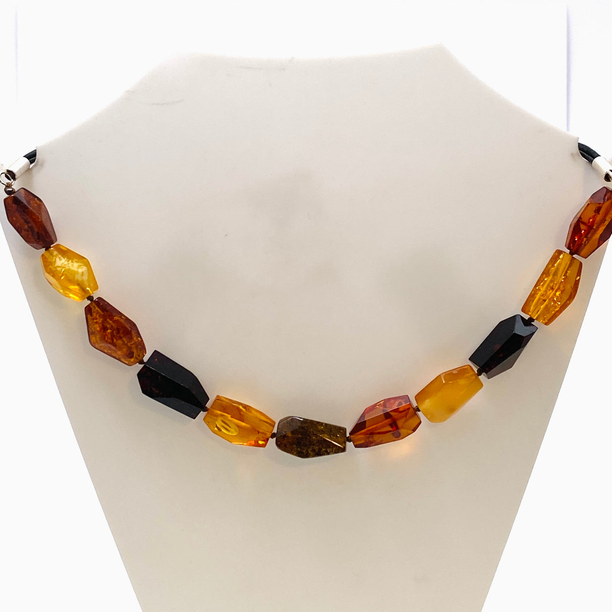 Baltic Amber Mixed beaded necklace on black leather AMB306