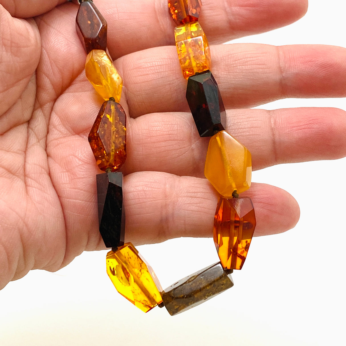 Baltic Amber Mixed beaded necklace on black leather AMB306