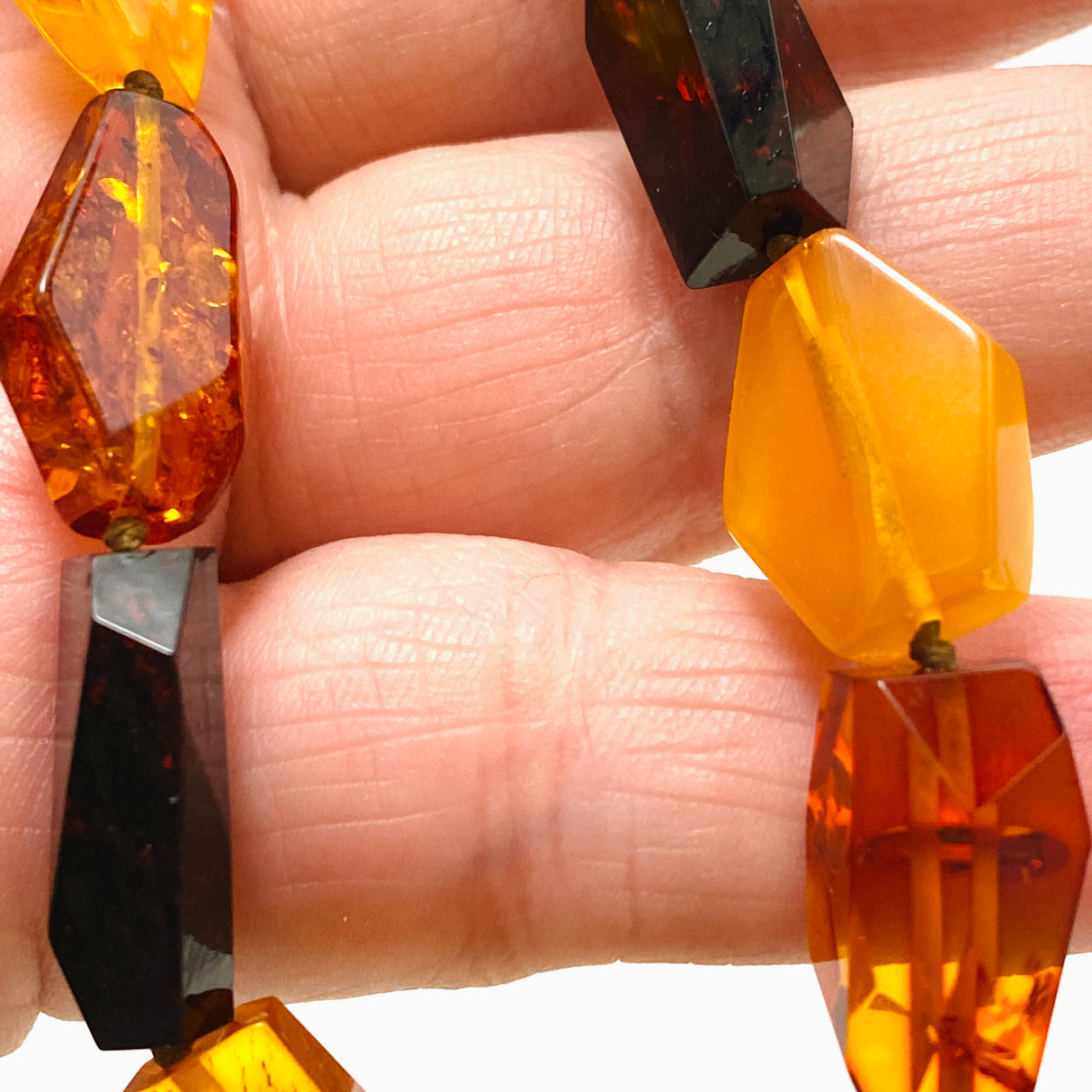 Baltic Amber Mixed beaded necklace on black leather AMB306