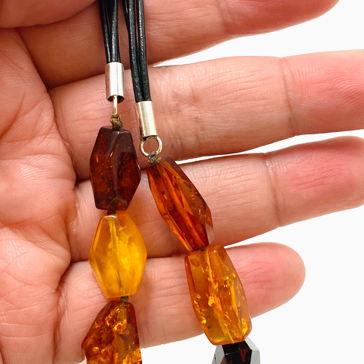 Baltic Amber Mixed beaded necklace on black leather AMB306