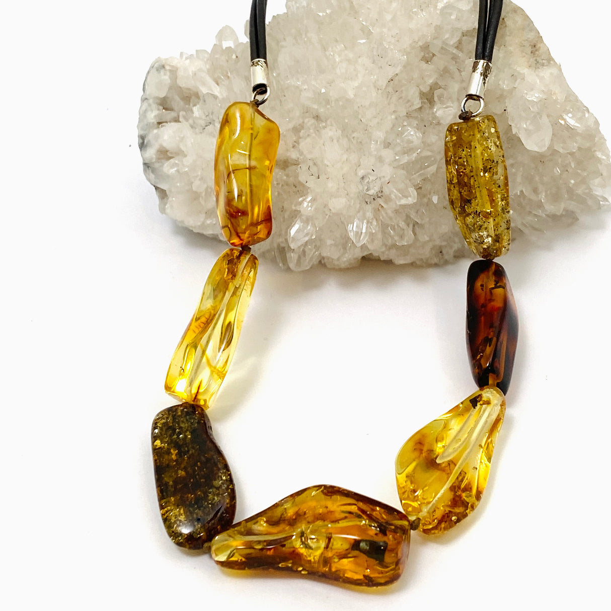 Baltic Amber Mixed beaded necklace on black leather AMB307