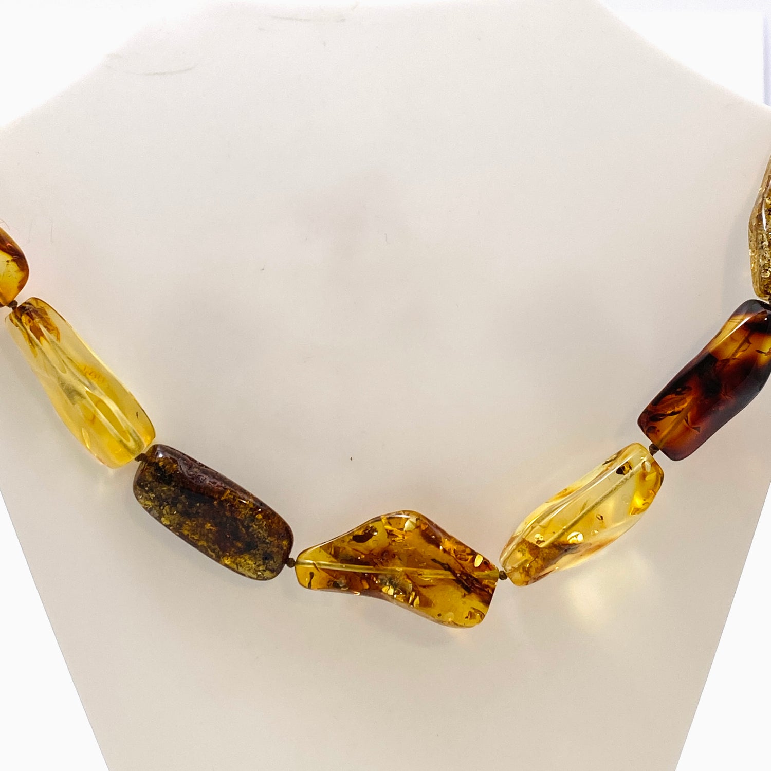 Baltic Amber Mixed beaded necklace on black leather AMB307