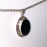 Black Star Diopside Oval Pendant in a Hammered Setting KPGJ4477 - Nature's Magick