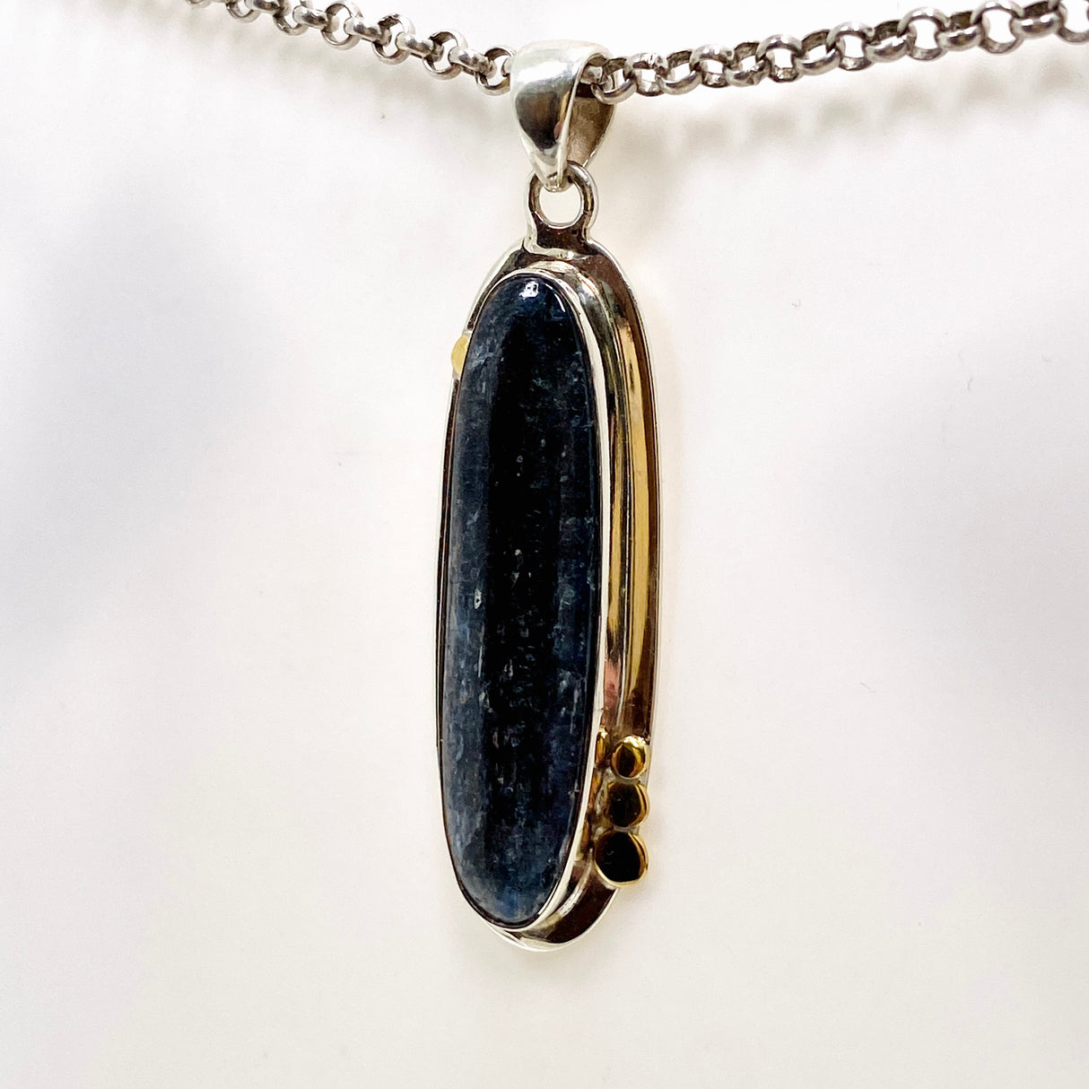 Blue Kyanite Oval Cabochon Pendant with Brass Detailing KPGJ4617