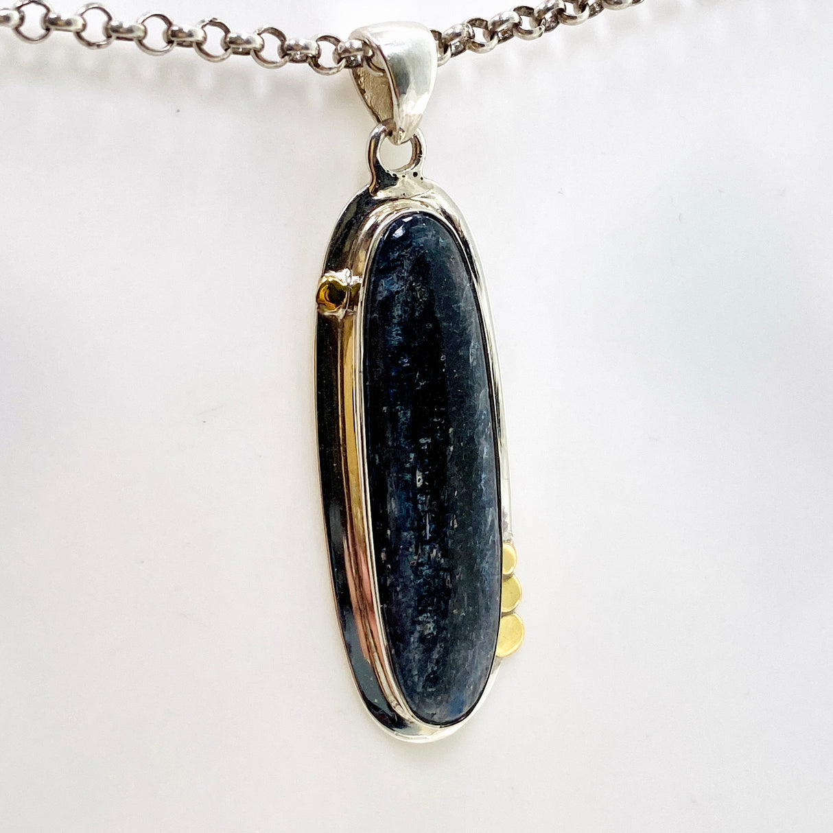 Blue Kyanite Oval Cabochon Pendant with Brass Detailing KPGJ4617