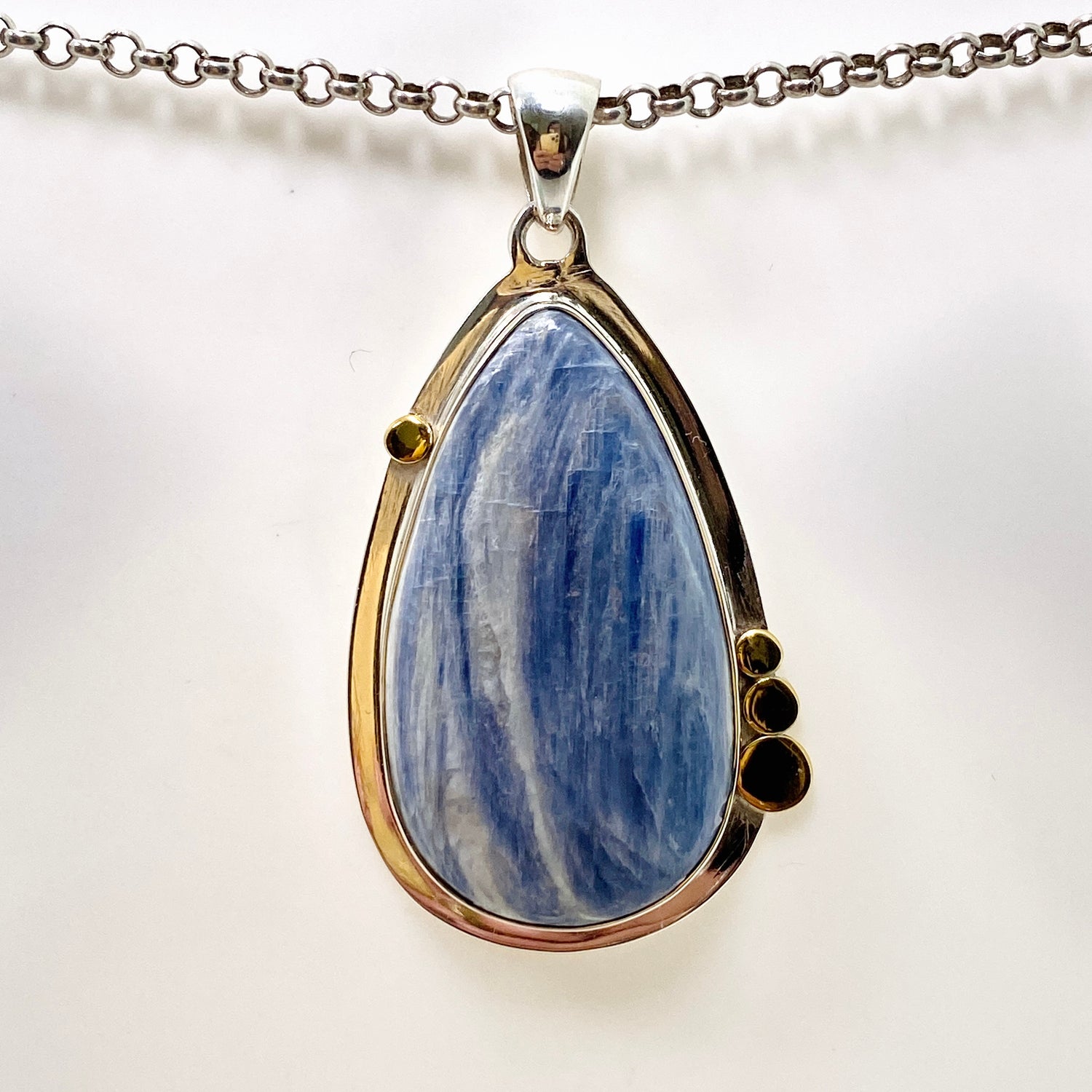 Blue Kyanite Teardrop Pendant with Brass Accents KPGJ4624