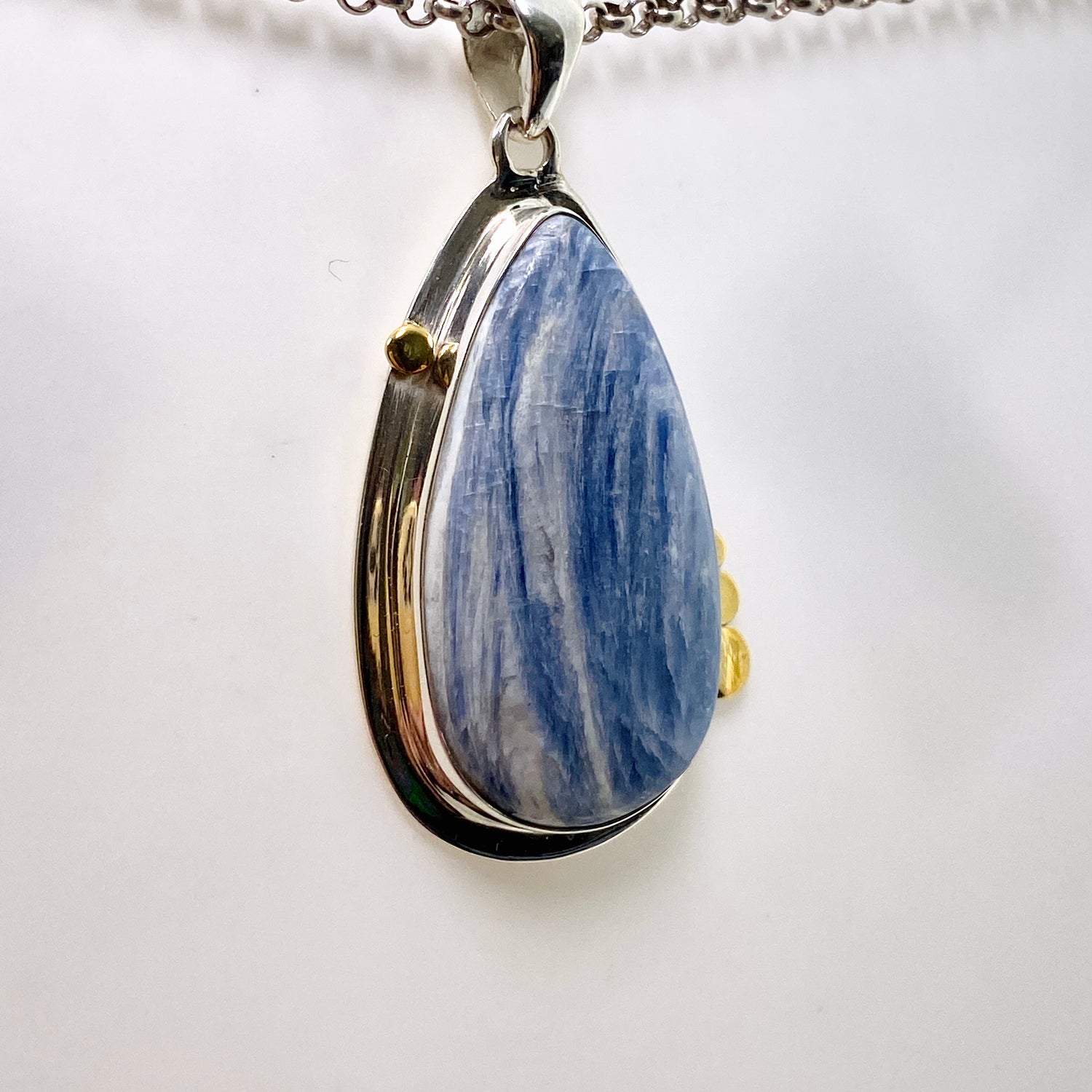 Blue Kyanite Teardrop Pendant with Brass Accents KPGJ4624