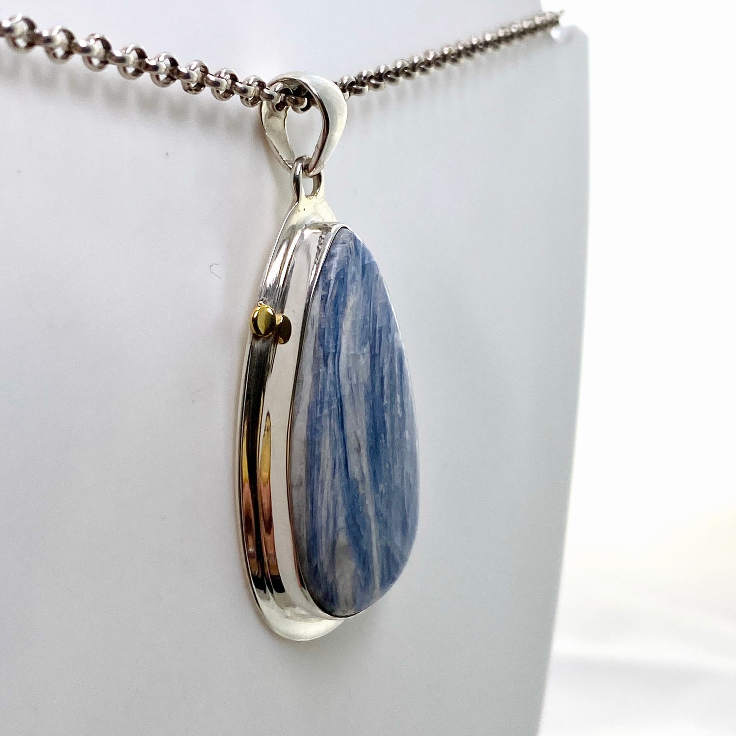 Blue Kyanite Teardrop Pendant with Brass Accents KPGJ4624