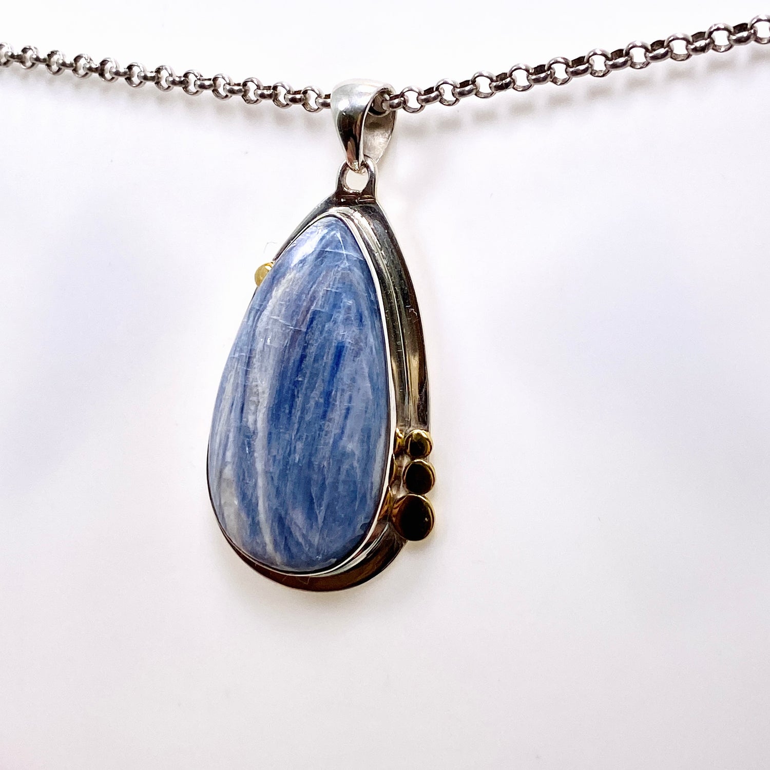 Blue Kyanite Teardrop Pendant with Brass Accents KPGJ4624