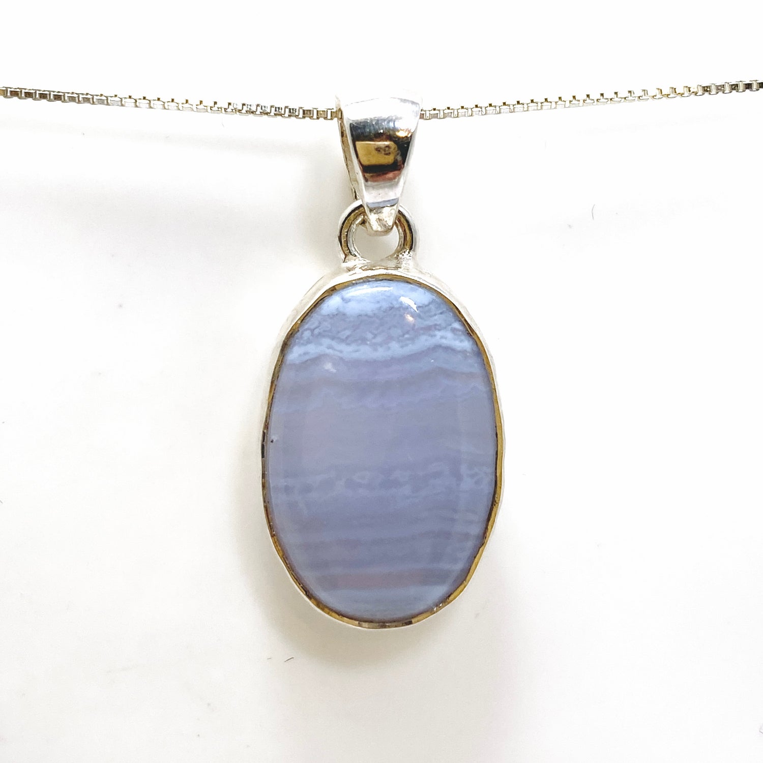 Blue Lace Agate Oval Cabochon Pendant in a Hammered Setting KPGJ4818
