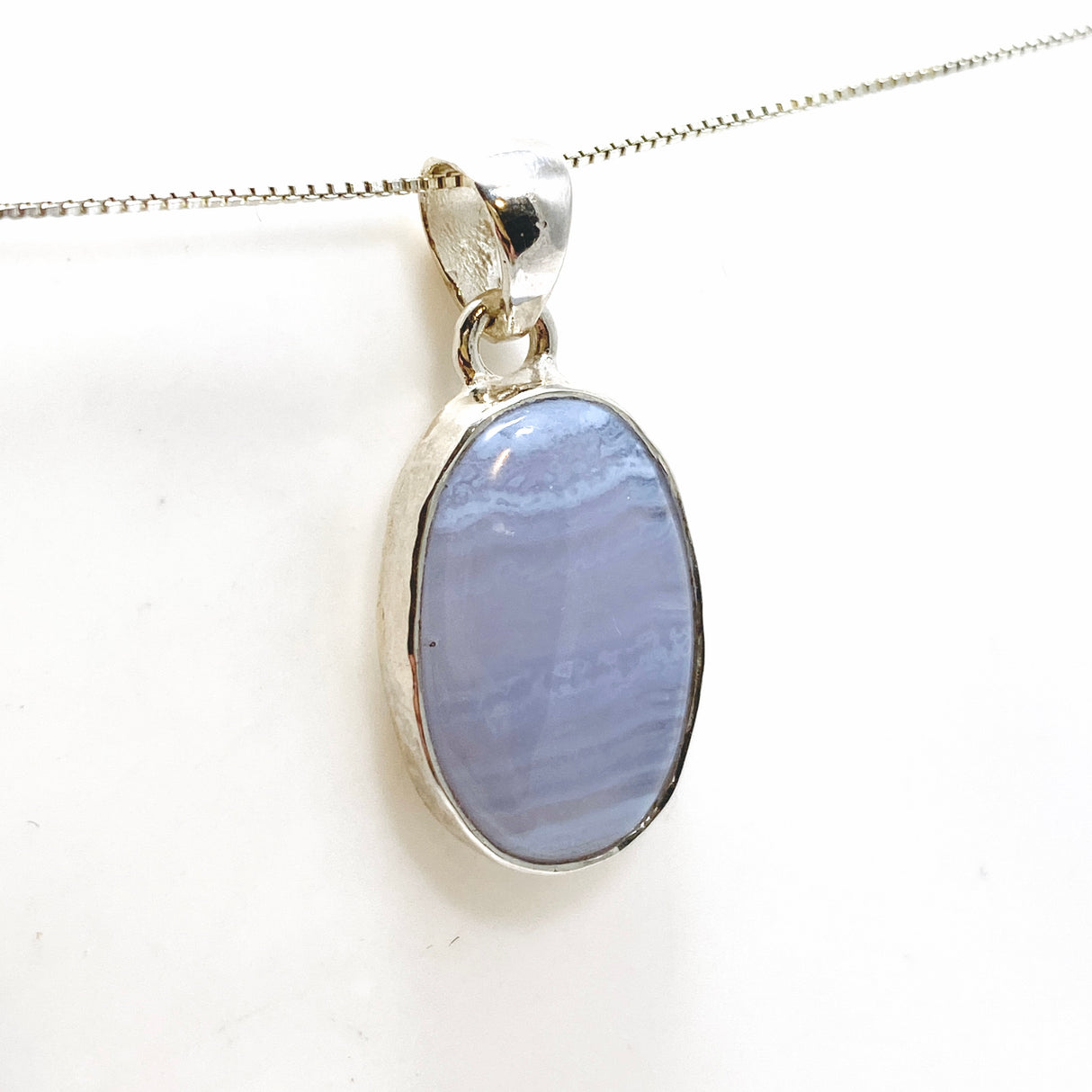 Blue Lace Agate Oval Cabochon Pendant in a Hammered Setting KPGJ4818