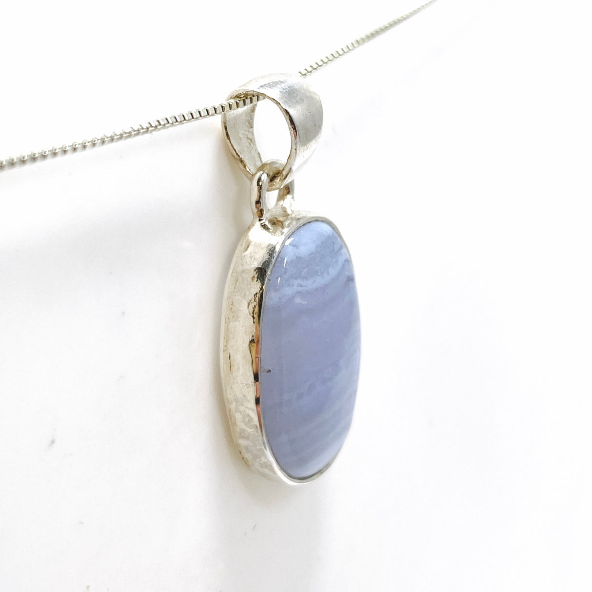 Blue Lace Agate Oval Cabochon Pendant in a Hammered Setting KPGJ4818