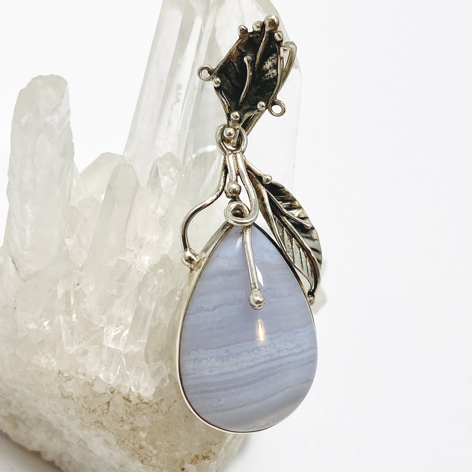 Blue Lace Agate Teardrop Cabochon Pendant in a Botanical Setting PPGJ989