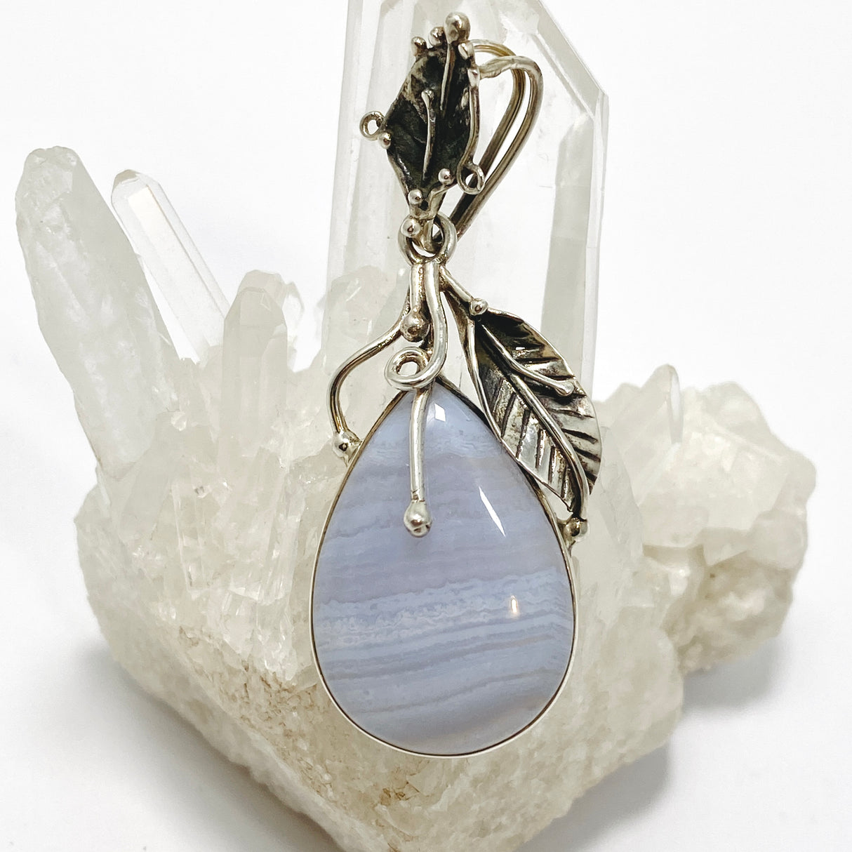 Blue Lace Agate Teardrop Cabochon Pendant in a Botanical Setting PPGJ989