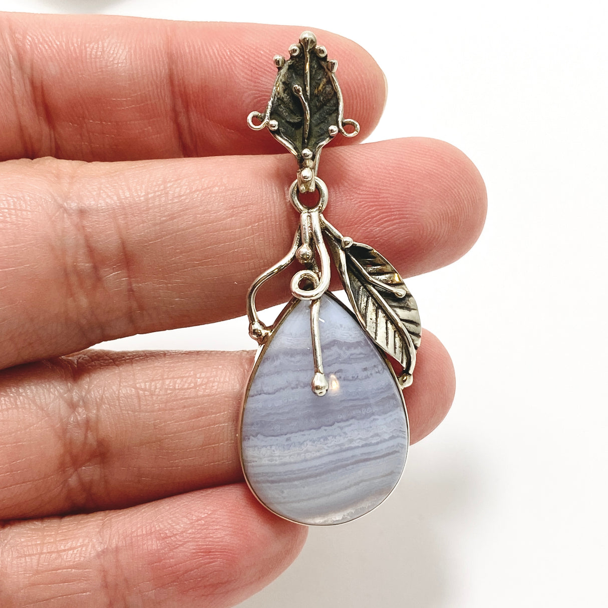 Blue Lace Agate Teardrop Cabochon Pendant in a Botanical Setting PPGJ989