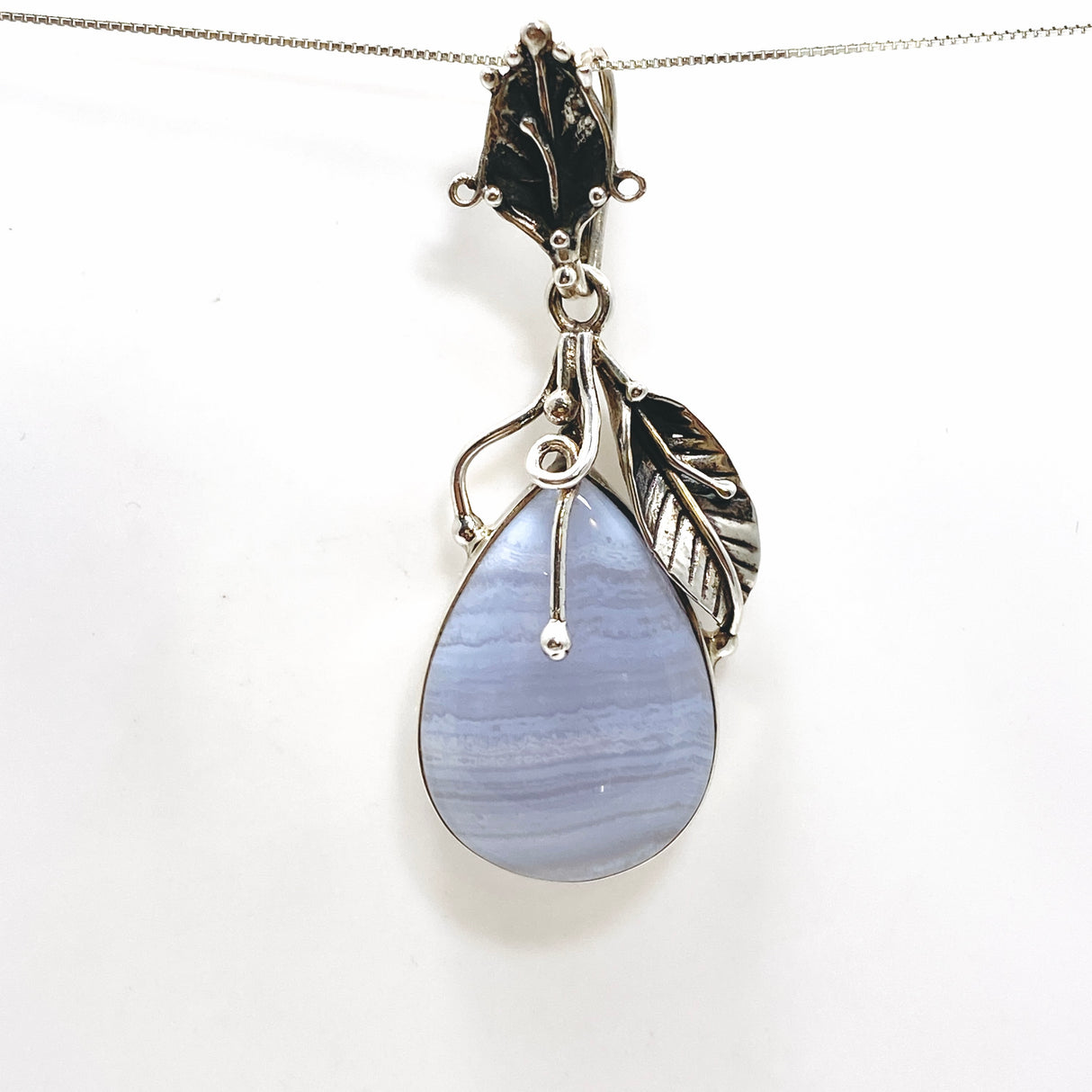 Blue Lace Agate Teardrop Cabochon Pendant in a Botanical Setting PPGJ989