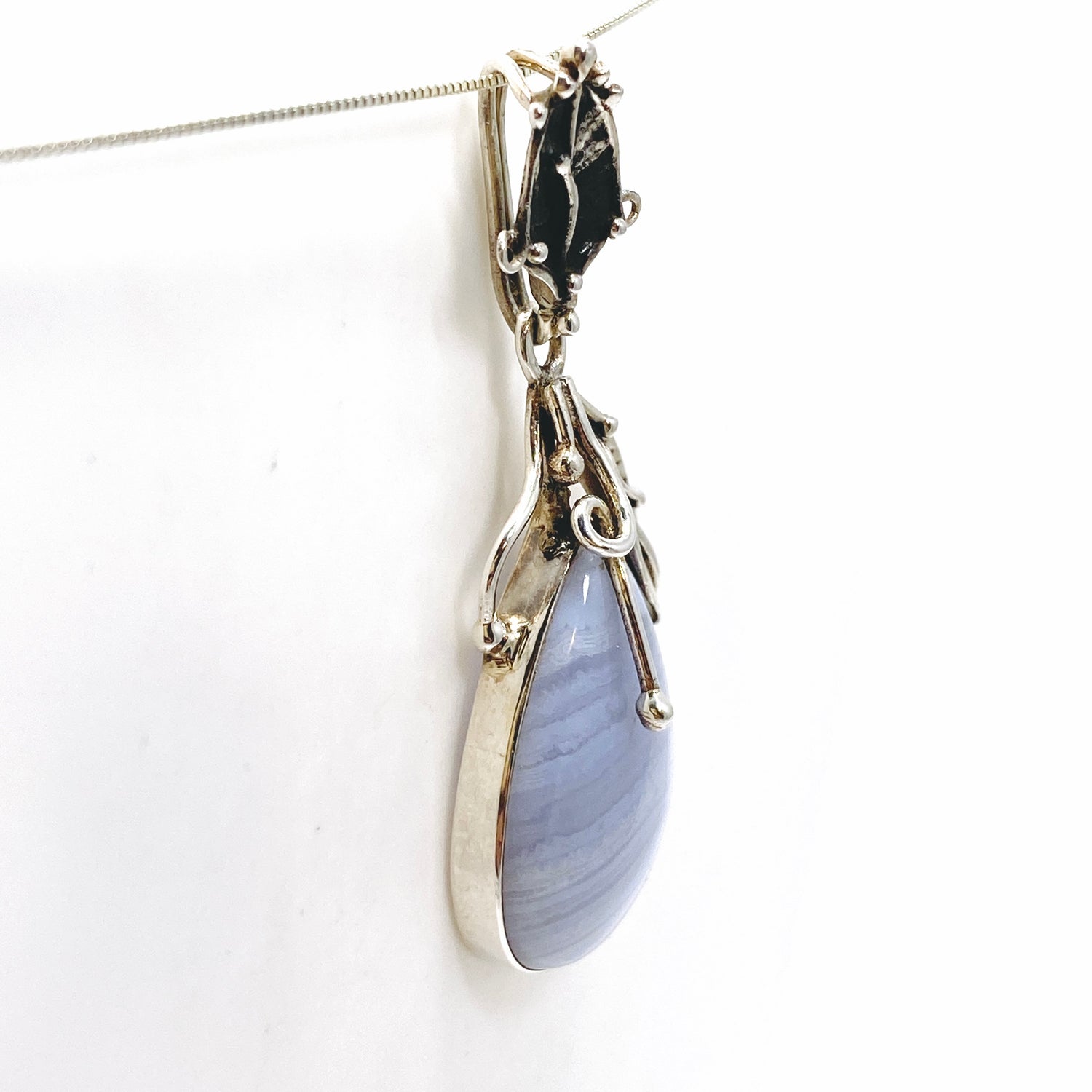 Blue Lace Agate Teardrop Cabochon Pendant in a Botanical Setting PPGJ989