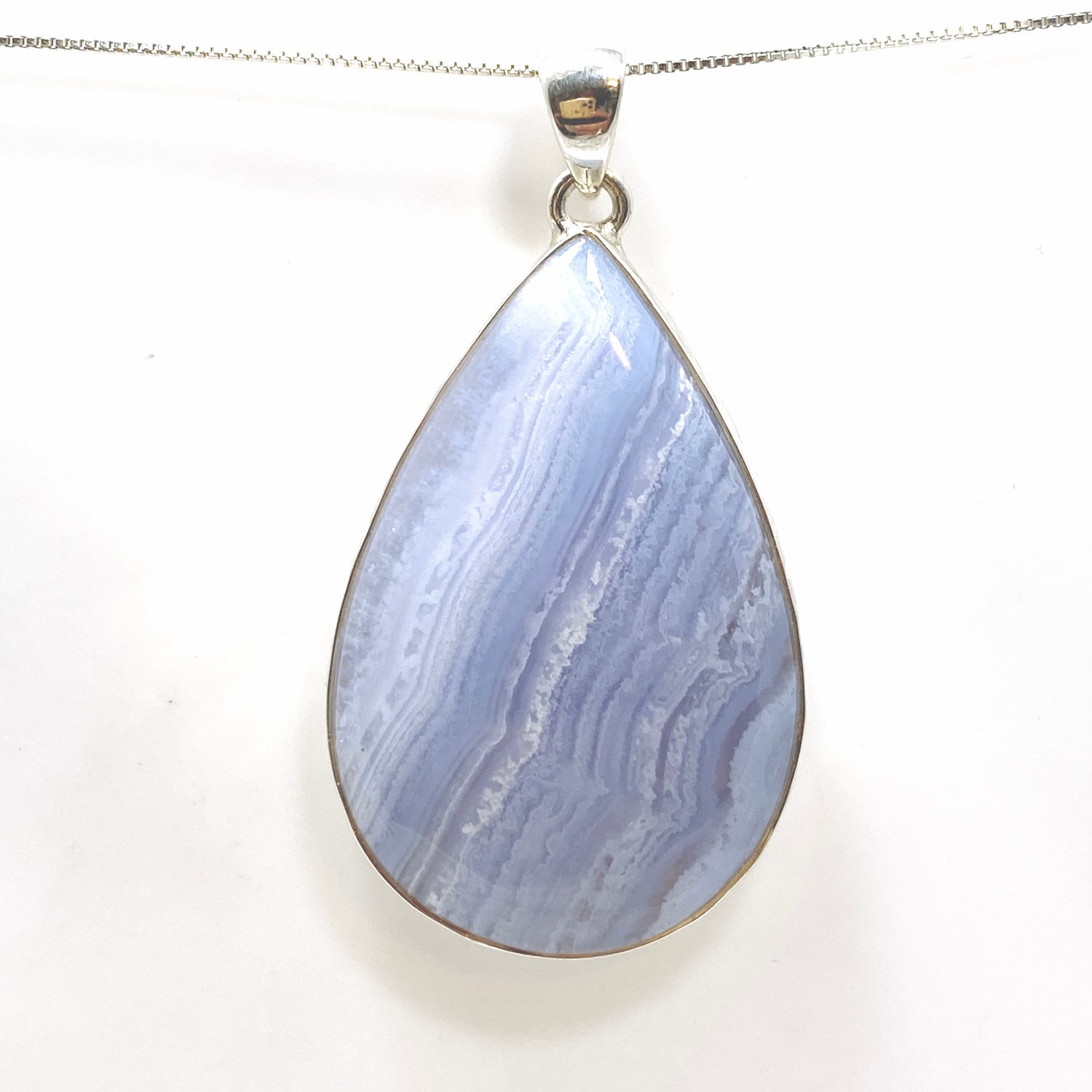 Blue Lace Agate Teardrop Cabochon Pendant in a Hammered Setting KPGJ4831