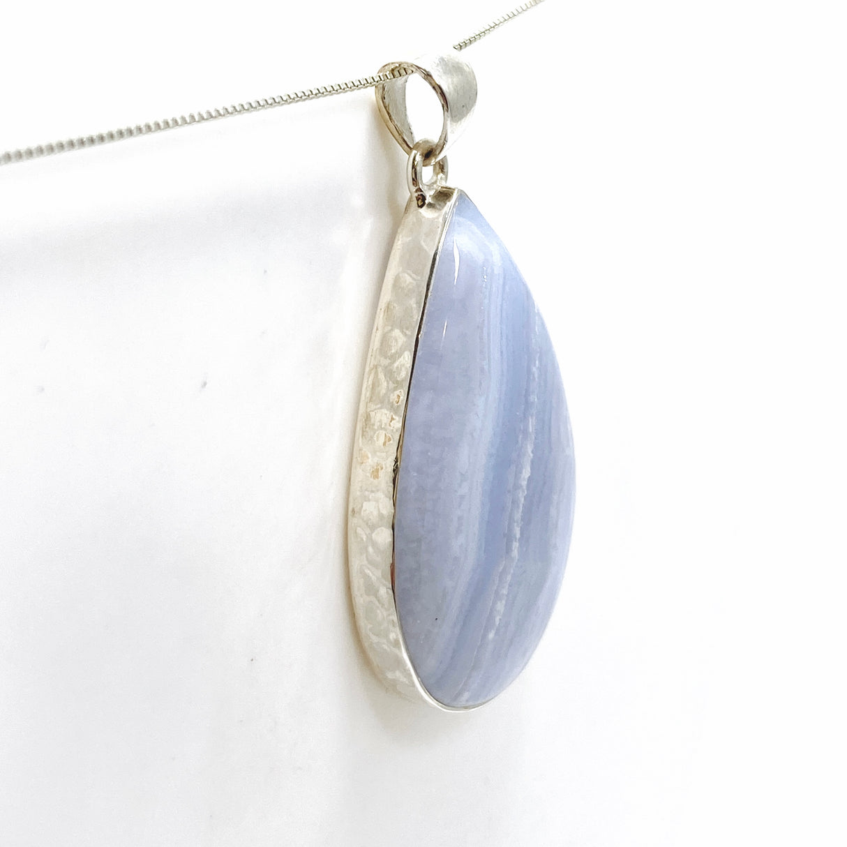 Blue Lace Agate Teardrop Cabochon Pendant in a Hammered Setting KPGJ4831