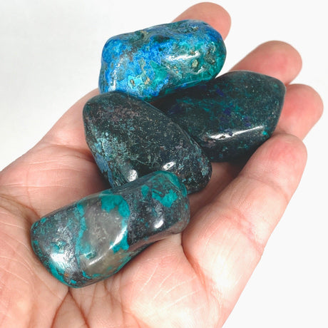 Dioptase tumbled stones - Nature's Magick