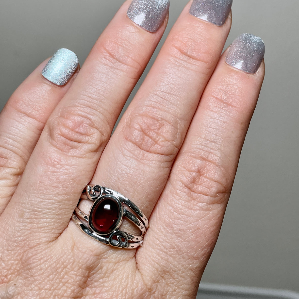 Garnet Oval Cabochon Ring in a Decorative Setting R4025