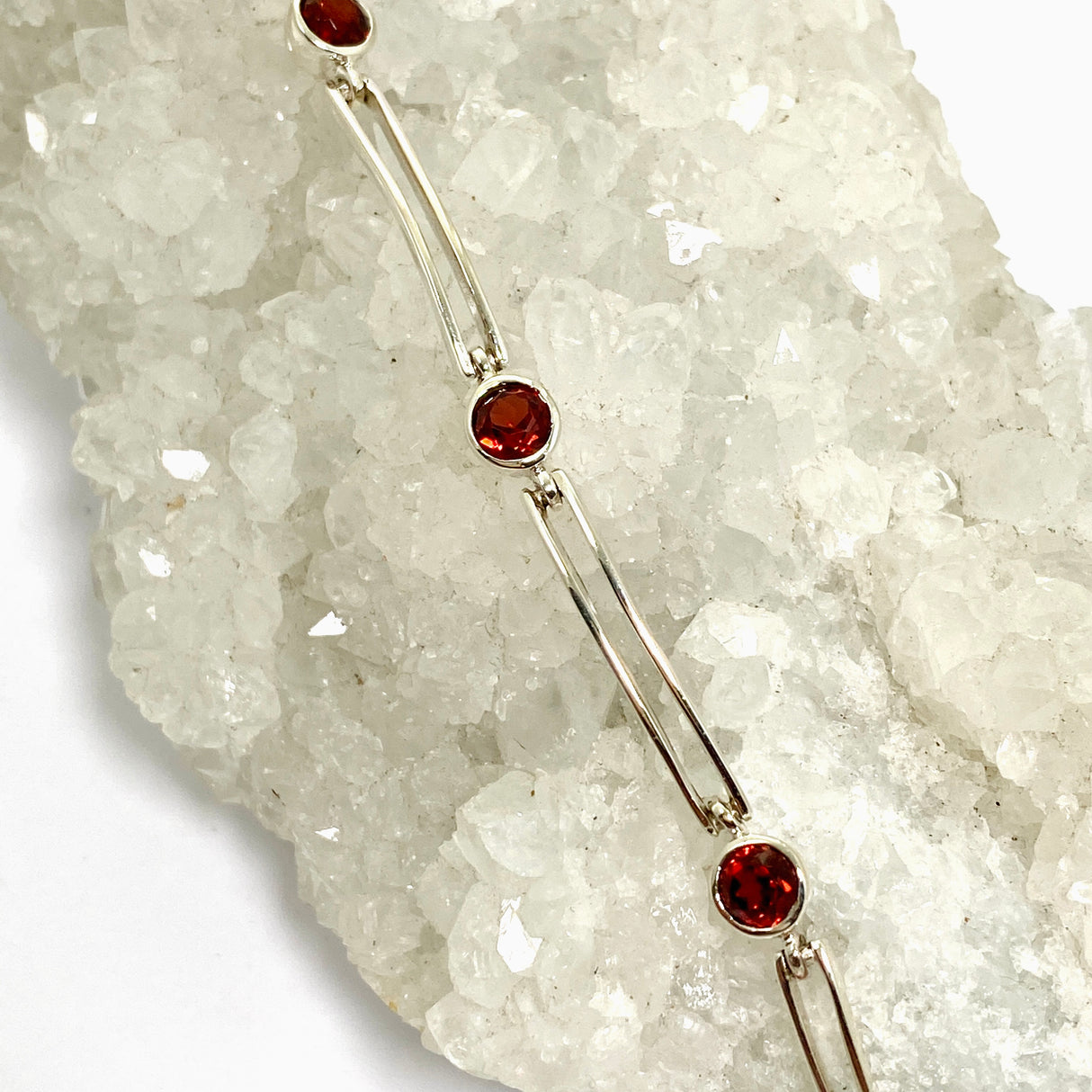 Garnet round faceted gemstones with silver split spacer design