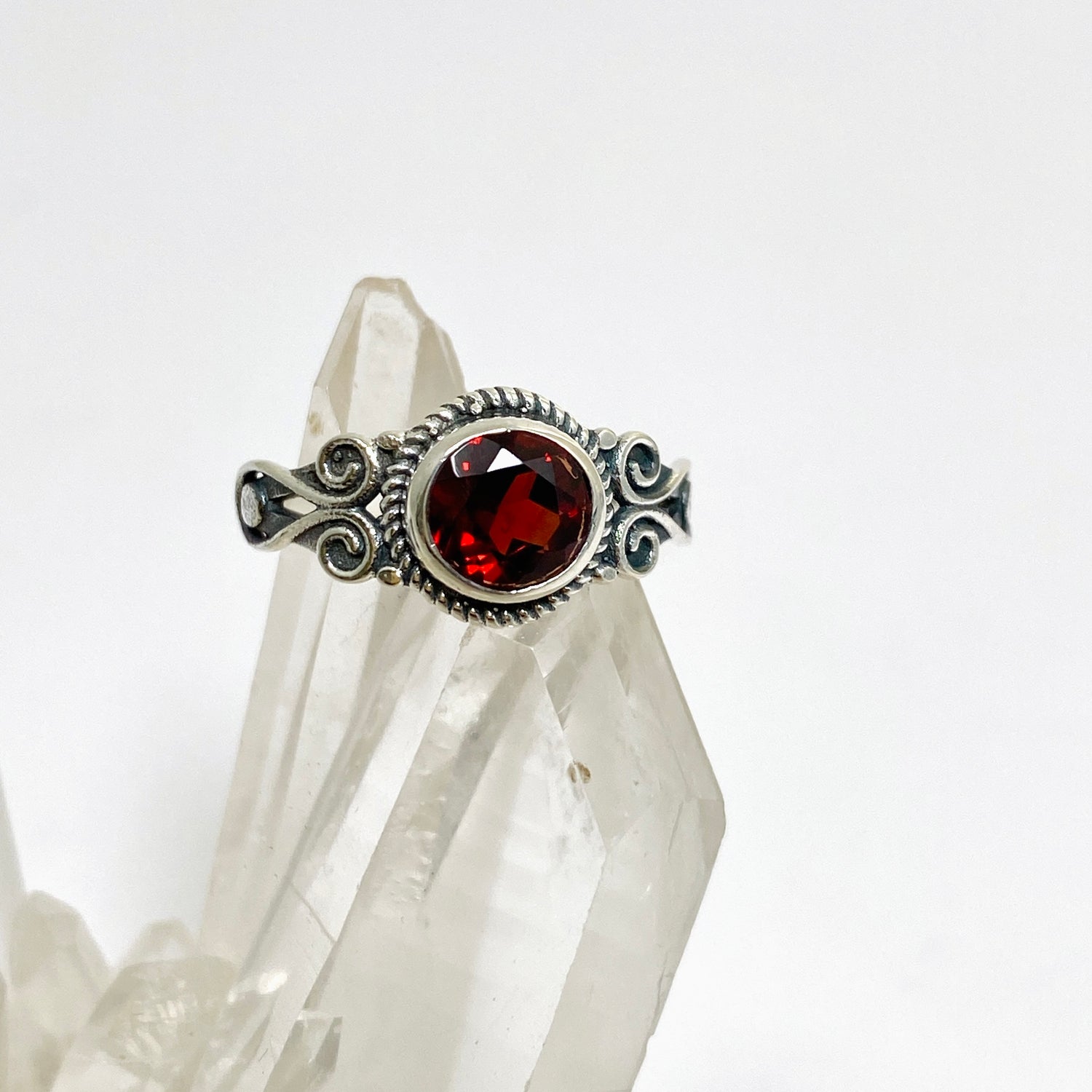 Garnet Round Faceted Ring in a Decorative Setting R4170