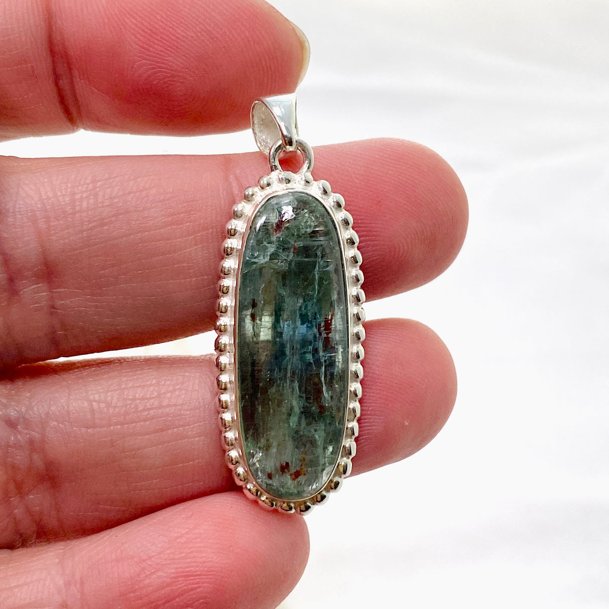 Green Kyanite Oval Cabochon Pendant in a Decorative Setting KPGJ4632