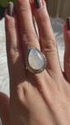 Moonstone teardrop split band ring with a decorative setting s.8 KRGJ350