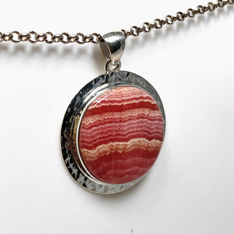 Rhodochrosite Round Pendant in a Hammered Setting KPGJ4321 - Nature's Magick