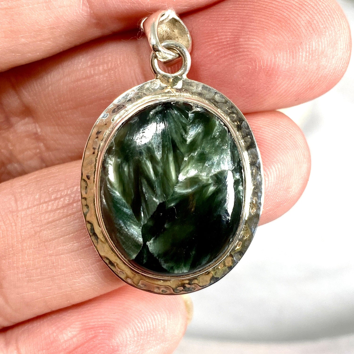 Seraphinite oval cabochon pendant with beaten banding KPGJ2511 - Nature's Magick