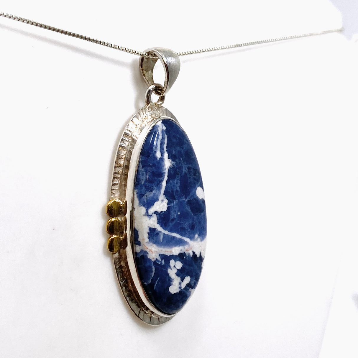 Sodalite Oval Cabochon Pendant in a Decorative Setting KPGJ4809