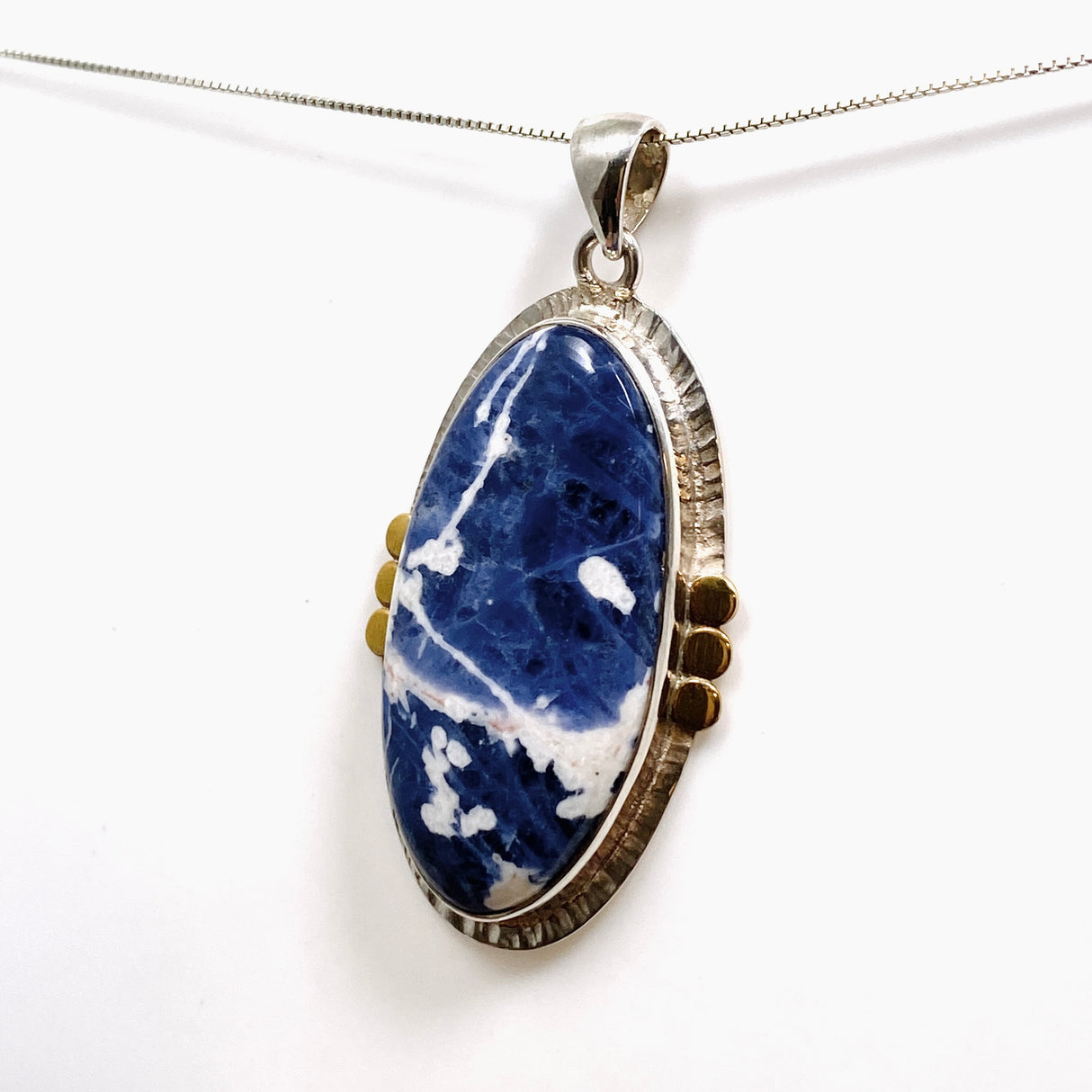 Sodalite Oval Cabochon Pendant in a Decorative Setting KPGJ4809
