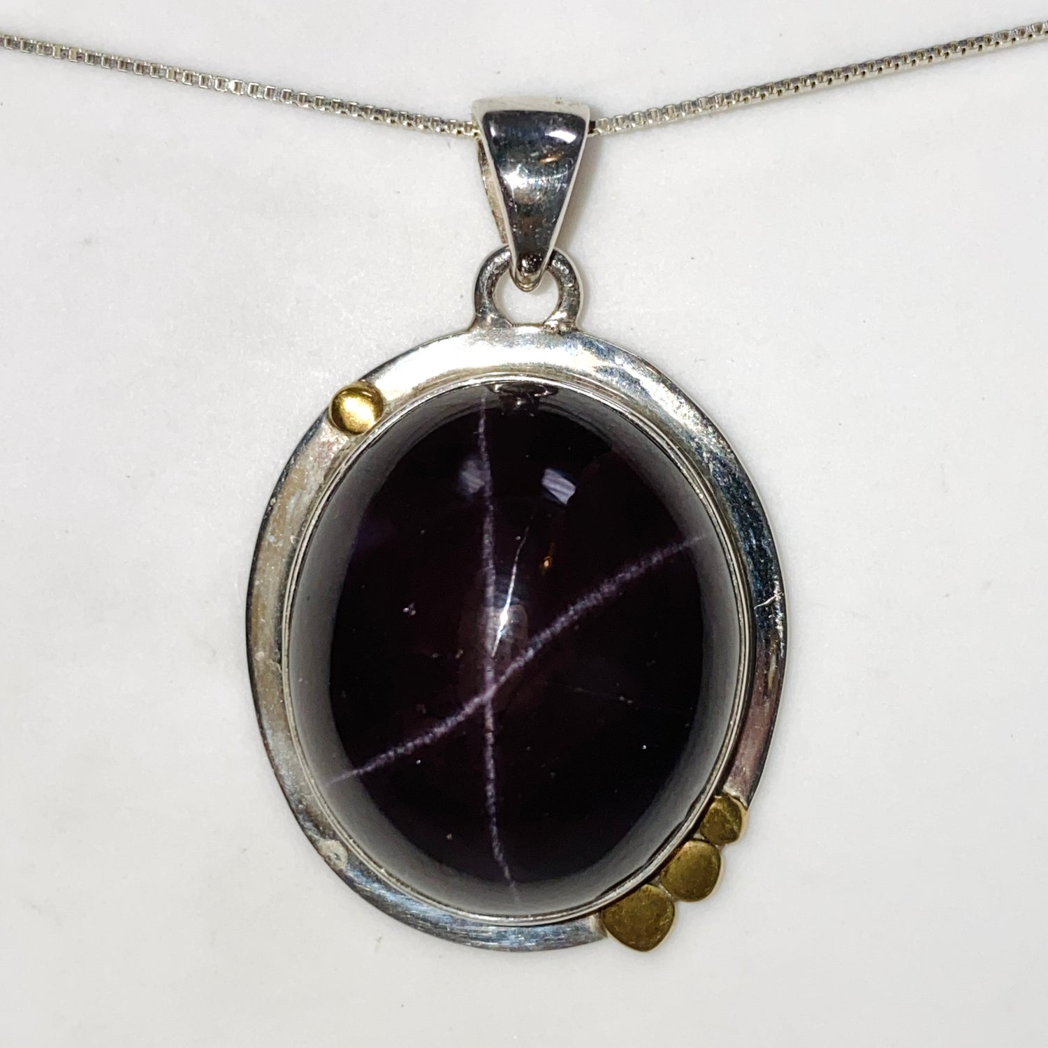 Star Garnet Oval Cabochon Pendant in a Decorative Setting KPGJ4848