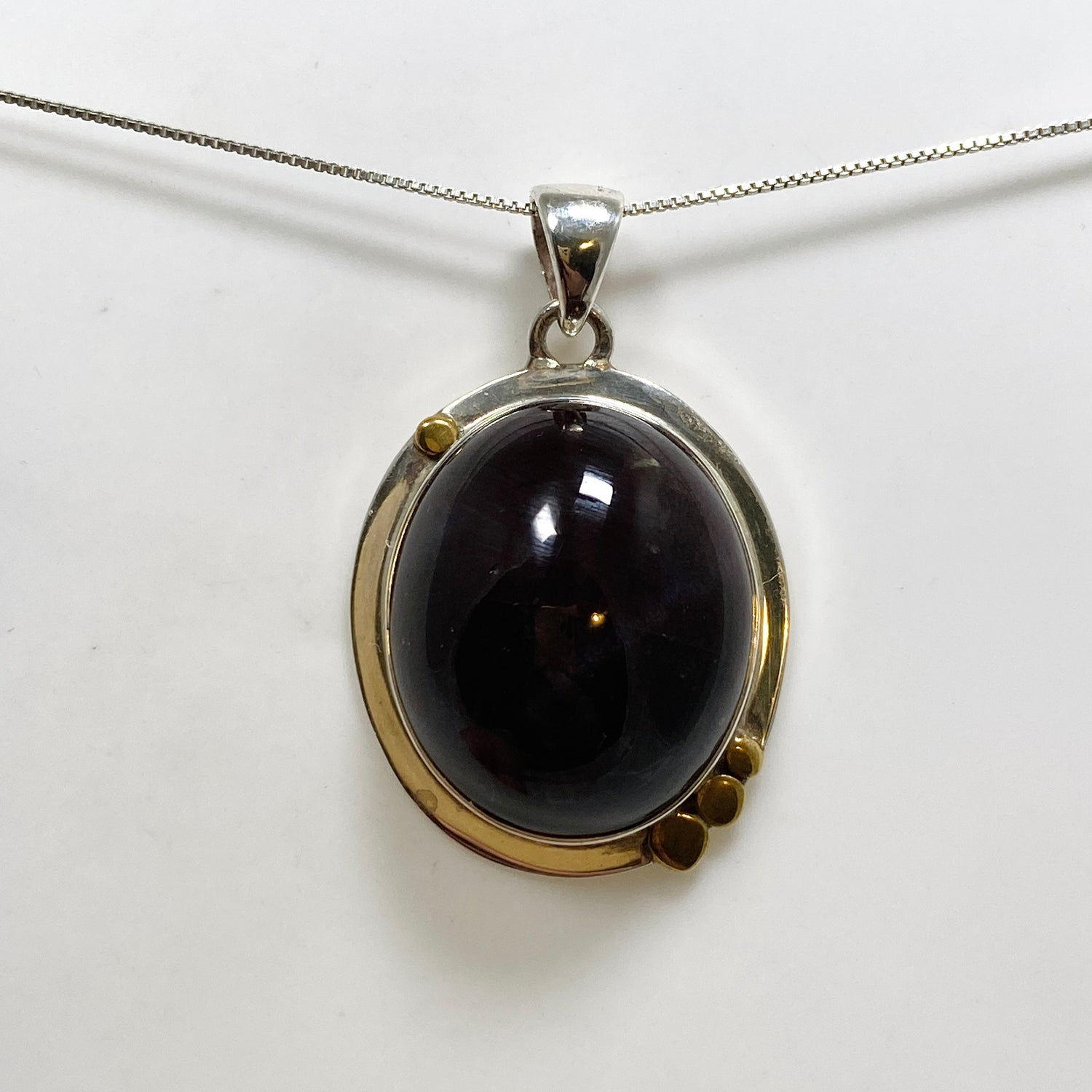 Star Garnet Oval Cabochon Pendant in a Decorative Setting KPGJ4848