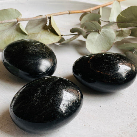 Black tourmaline palmstone 100-150g BTP-L - Nature's Magick