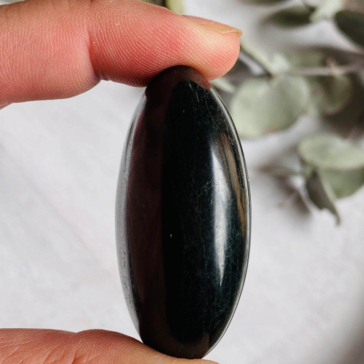 Black tourmaline palmstone 70-100g BTP-S - Nature's Magick