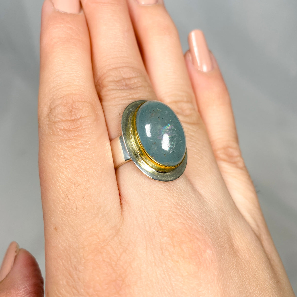 Aquamarine oval ring with gold detailing s.7 KRGJ2882