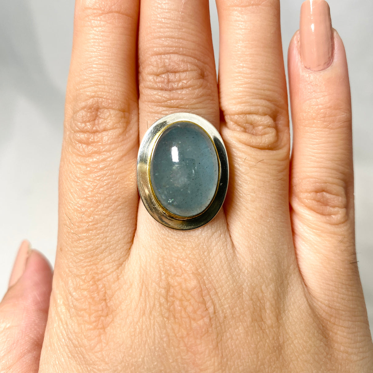 Aquamarine oval ring with gold detailing s.7 KRGJ2882