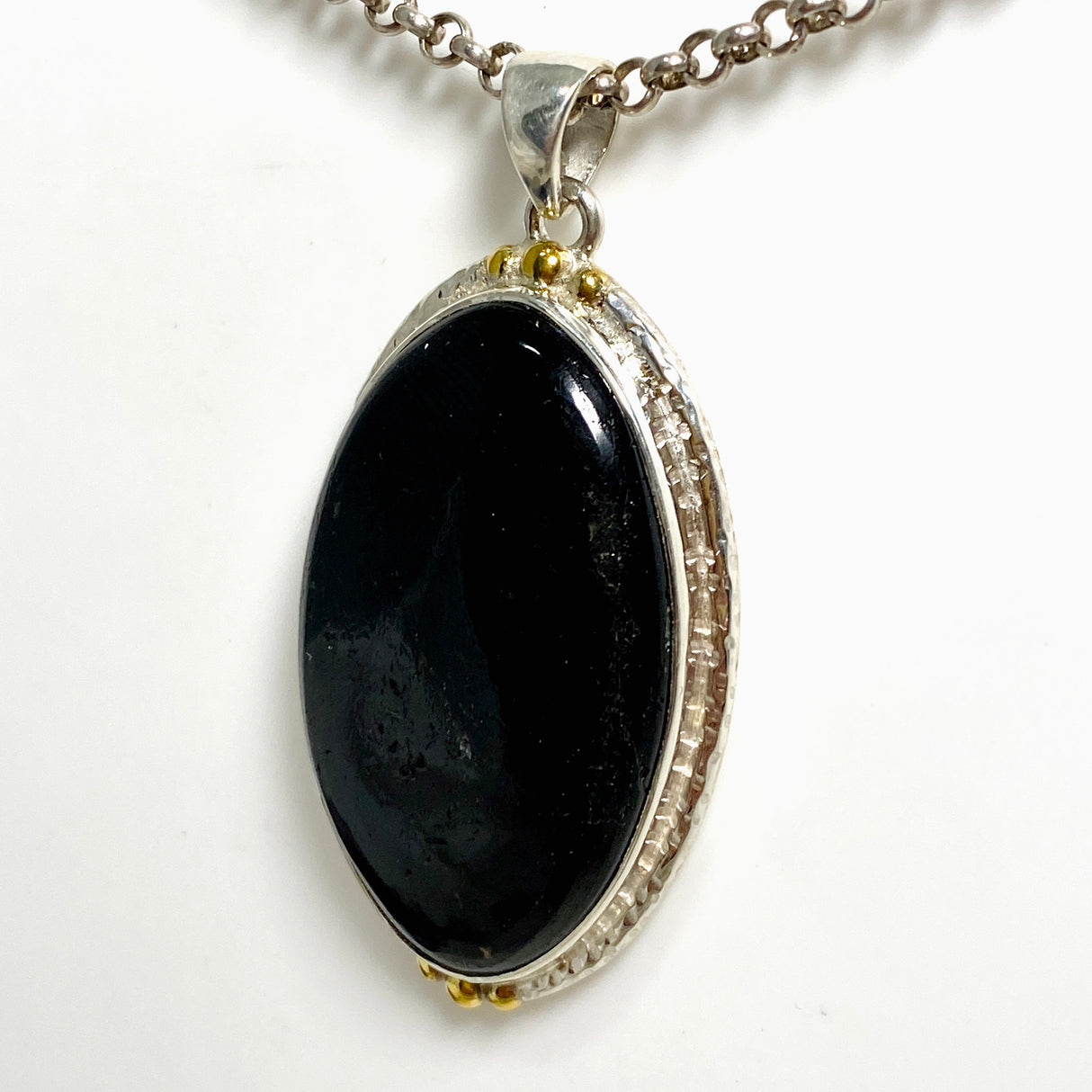 Black Tourmaline Oval Cabochon Pendant in a Decorative Setting KPGJ4594