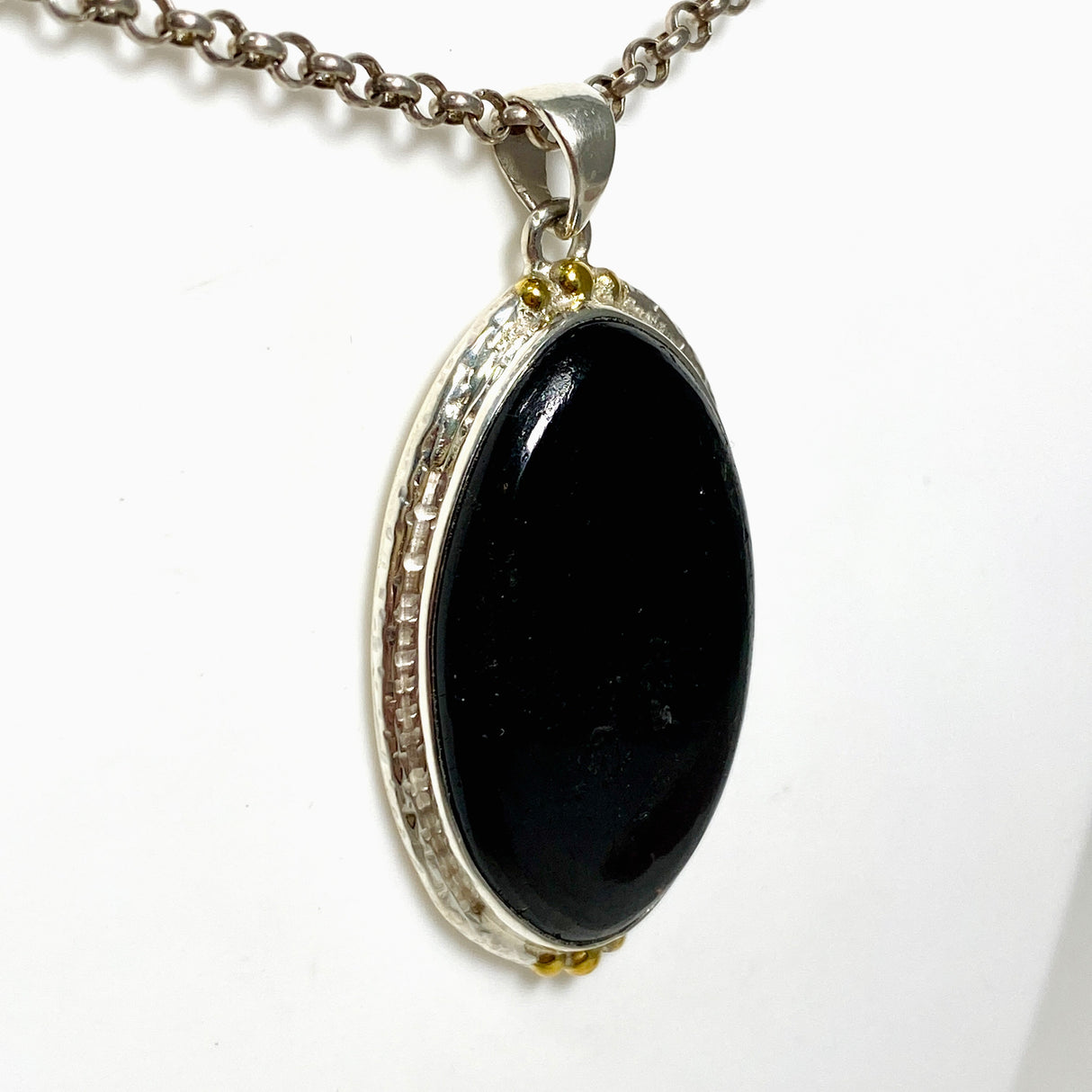 Black Tourmaline Oval Cabochon Pendant in a Decorative Setting KPGJ4594