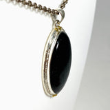 Black Tourmaline Oval Cabochon Pendant in a Decorative Setting KPGJ4594